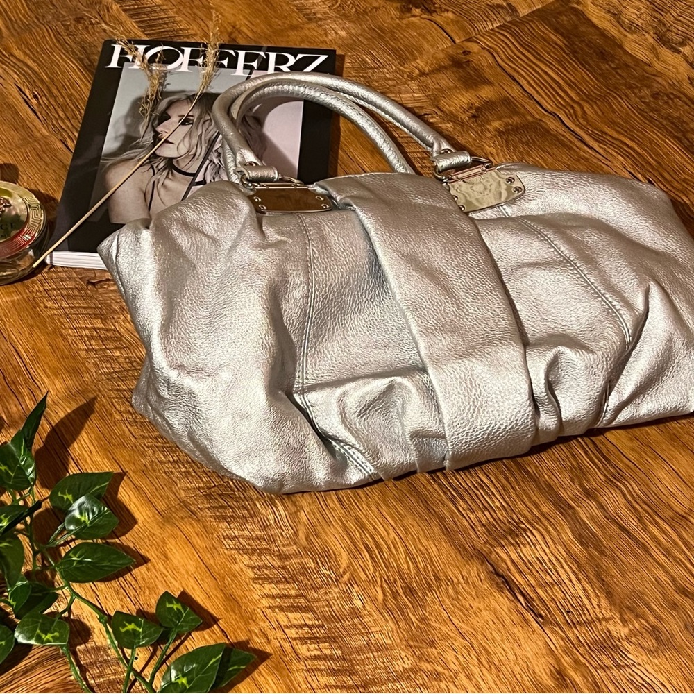 20. Aldo Silver metallic bag